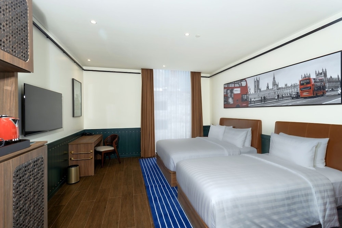 Imagen de la habitación del Hotel Ashley Tugu Tani Menteng. Foto 14