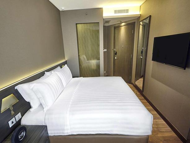 Imagen de la habitación del Hotel Ashley Wahid Hasyim Jakarta, Yakarta. Foto 6