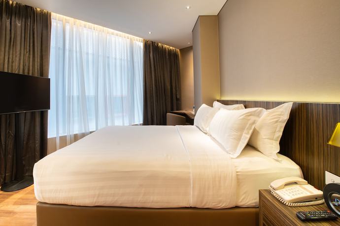 Imagen de la habitación del Hotel Ashley Wahid Hasyim Jakarta, Yakarta. Foto 2