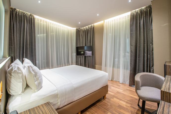 Imagen de la habitación del Hotel Ashley Wahid Hasyim Jakarta, Yakarta. Foto 12