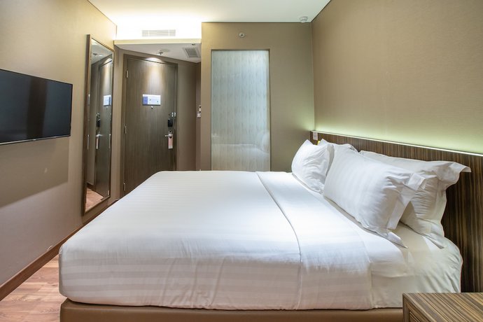 Imagen de la habitación del Hotel Ashley Wahid Hasyim Jakarta, Yakarta. Foto 14