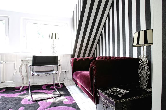 Imagen de la habitación del Hotel Ashley\'s Garden. Foto 2