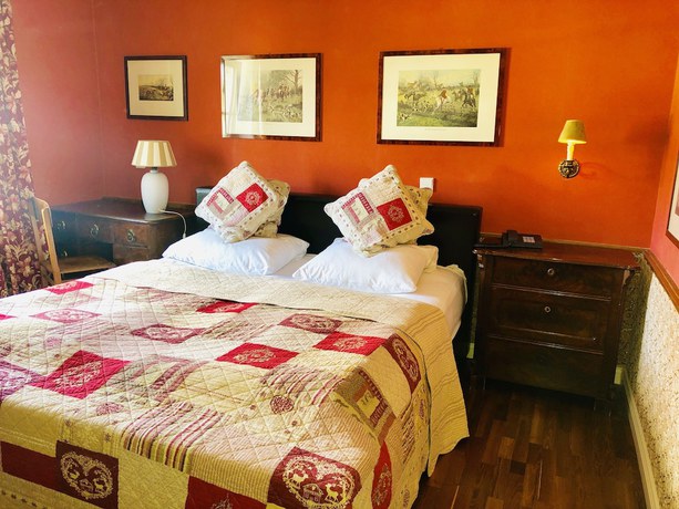Imagen de la habitación del Hotel Ashley\'s Garden. Foto 3