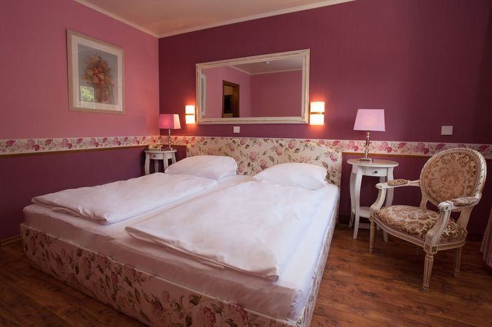 Imagen de la habitación del Hotel Ashley\'s Garden. Foto 6