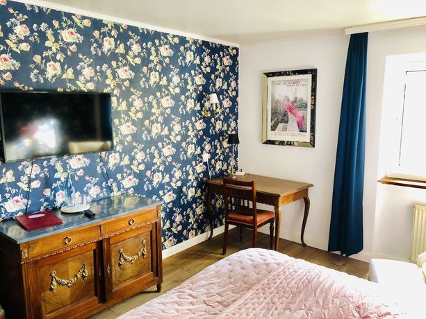 Imagen de la habitación del Hotel Ashley\'s Garden. Foto 8