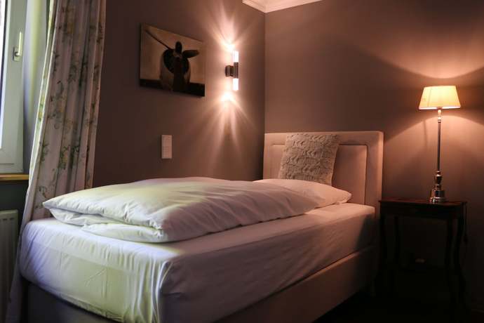 Imagen de la habitación del Hotel Ashley\'s Garden. Foto 15