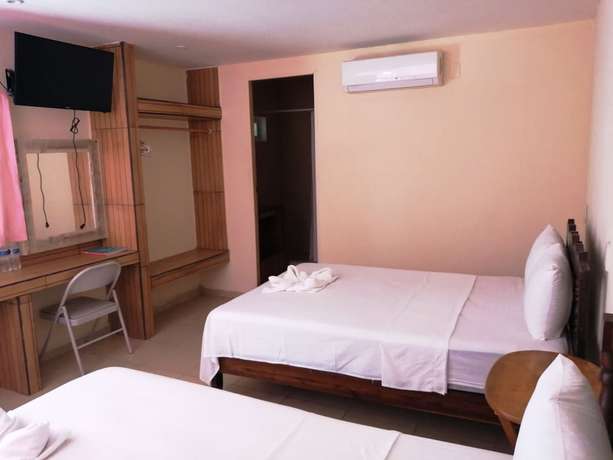 Imagen de la habitación del Hotel Ashly. Foto 8