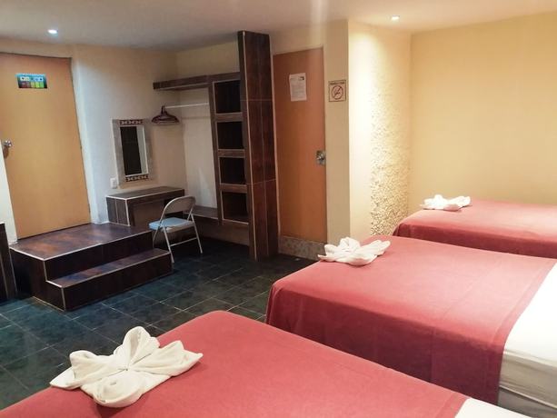 Imagen de la habitación del Hotel Ashly. Foto 13
