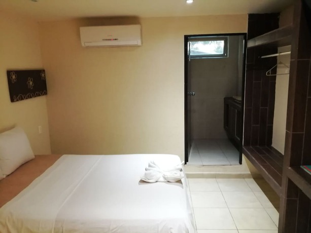 Imagen de la habitación del Hotel Ashly. Foto 16