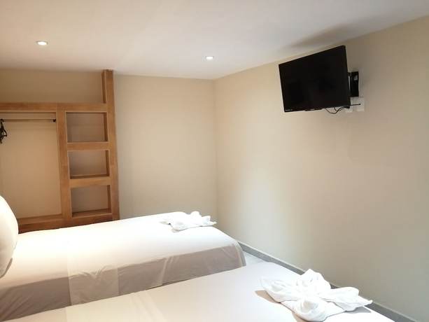 Imagen de la habitación del Hotel Ashly. Foto 18
