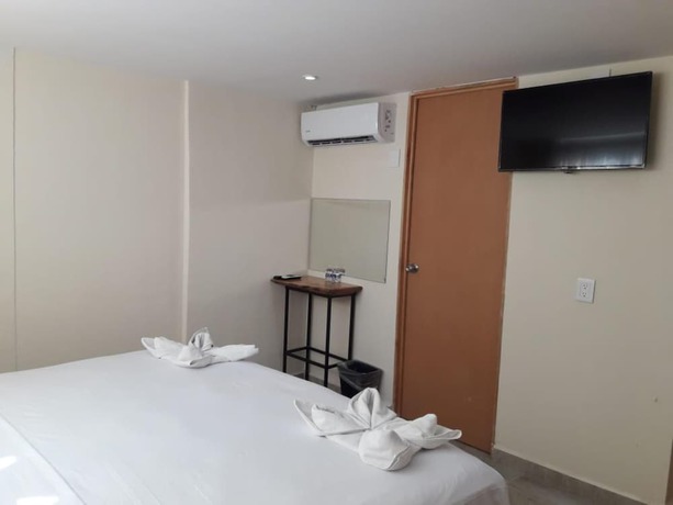 Imagen de la habitación del Hotel Ashly Loma Larga. Foto 4
