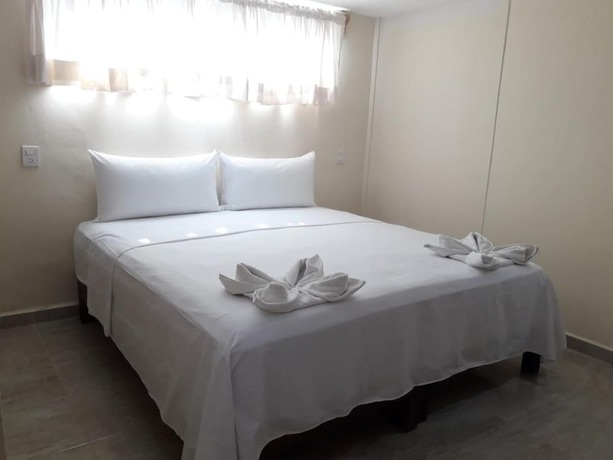 Imagen de la habitación del Hotel Ashly Loma Larga. Foto 17
