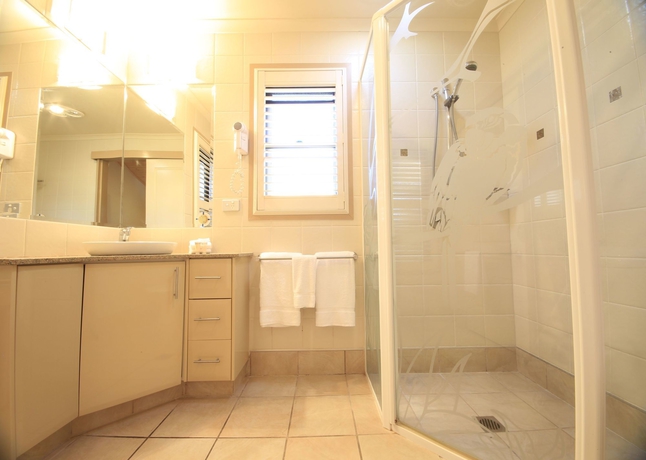 Imagen de la habitación del Hotel Ashmore Palms Holiday Village. Foto 4