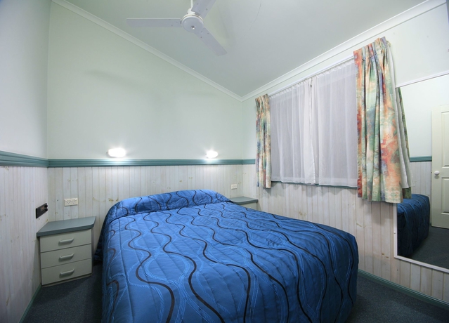 Imagen de la habitación del Hotel Ashmore Palms Holiday Village. Foto 11