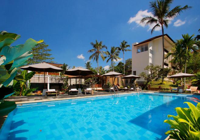 Imagen de la piscina del Hotel Ashoka Tree Resort At Tanggayuda, Ubud. Foto 9