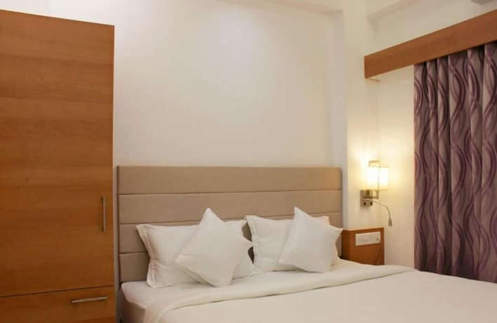 Imagen de la habitación del Hotel Ashray Inn. Foto 4