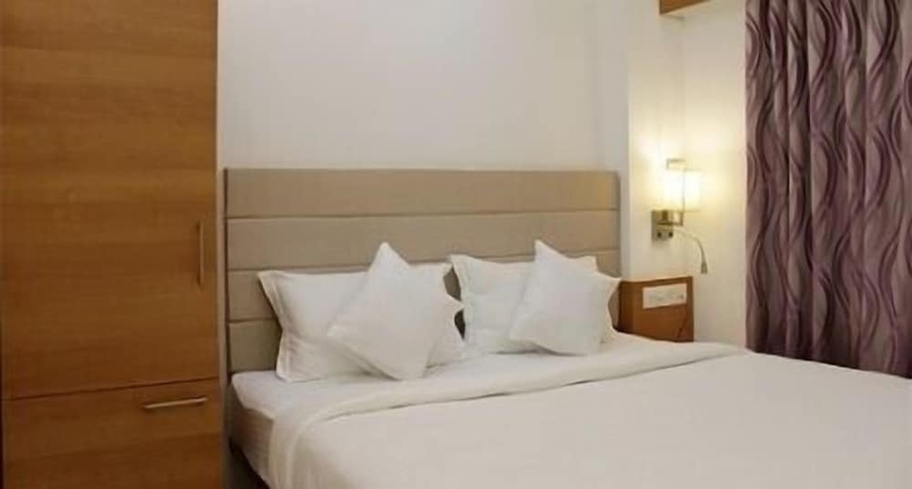 Imagen de la habitación del Hotel Ashray Inn. Foto 8