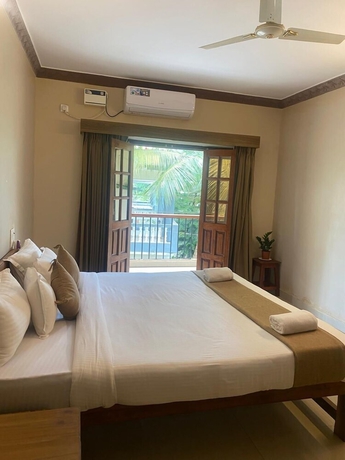 Imagen de la habitación del Hotel Ashvem Beach Inn. Foto 8