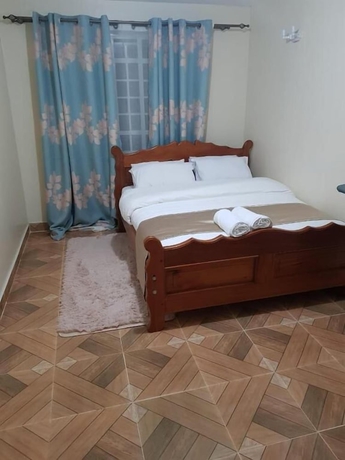 Imagen de la habitación del Hotel Ashville Homes. Foto 3