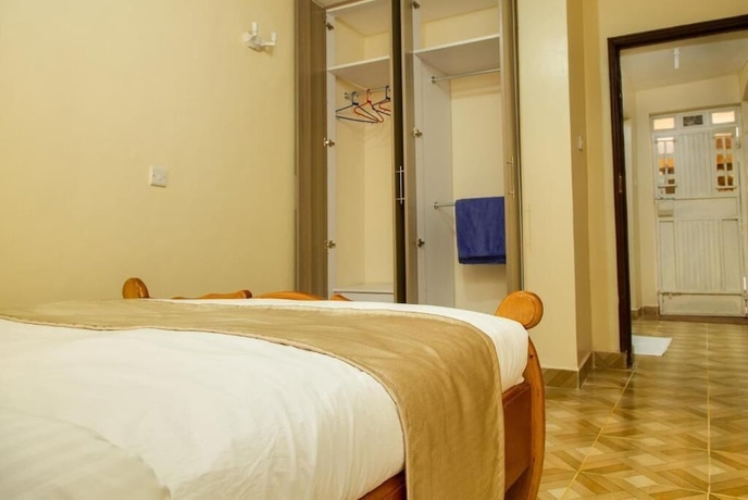 Imagen de la habitación del Hotel Ashville Homes. Foto 4