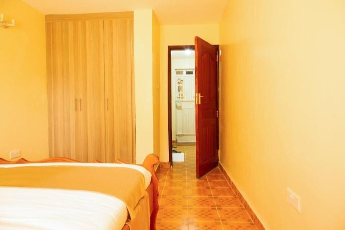 Imagen de la habitación del Hotel Ashville Homes. Foto 5