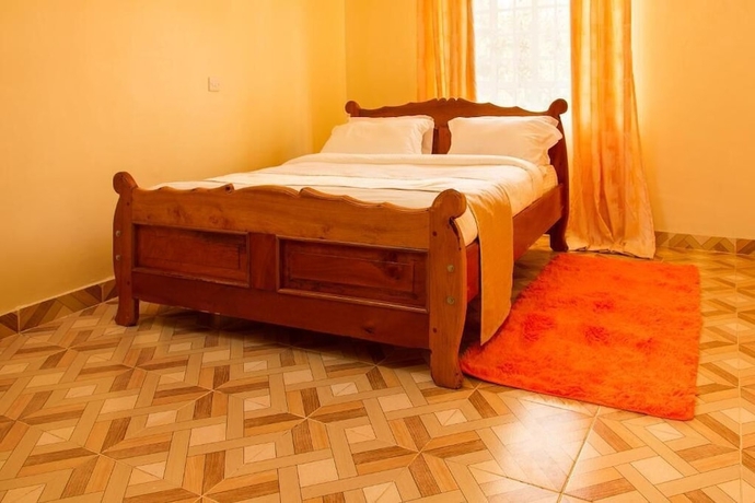 Imagen de la habitación del Hotel Ashville Homes. Foto 6