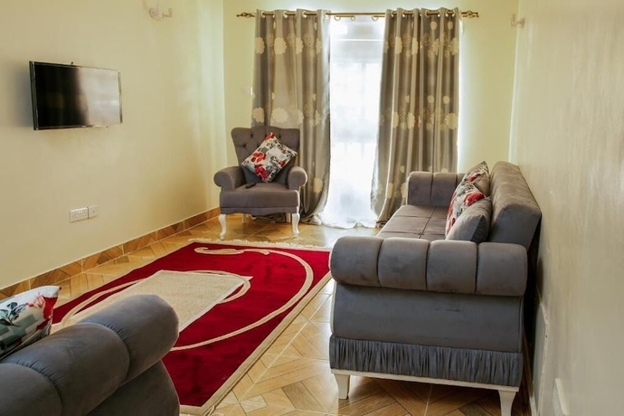 Imagen de la habitación del Hotel Ashville Homes. Foto 10