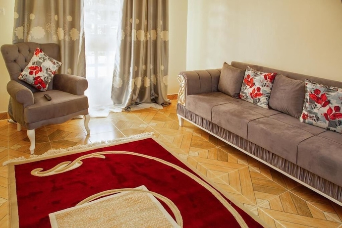 Imagen de la habitación del Hotel Ashville Homes. Foto 11