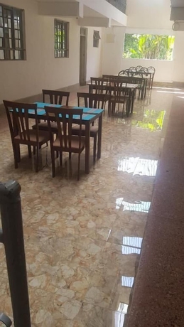 Imagen del bar/restaurante del Hotel Ashville Homes. Foto 2