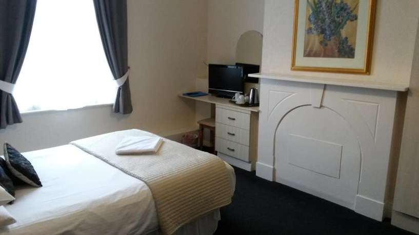 Imagen de la habitación del Hotel Ashwood. Foto 15