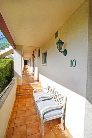 Imagen de la habitación del Hotel Ashwood Manor Motor Lodge. Foto 11