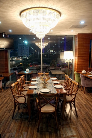 Imagen del bar/restaurante del Hotel Asia Artemis Suite. Foto 1