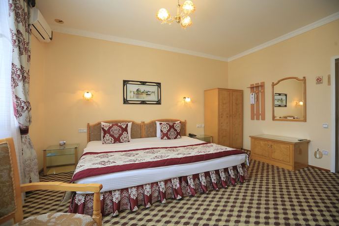 Imagen de la habitación del Hotel Asia Fergana. Foto 2