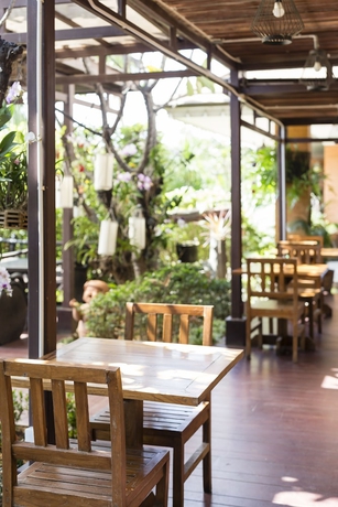 Imagen del bar/restaurante del Hotel Asia Hotels Group - Poonpetch Chiangmai. Foto 7