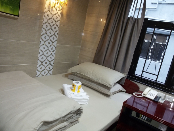 Imagen de la habitación del Hotel Asia Inn. Foto 4