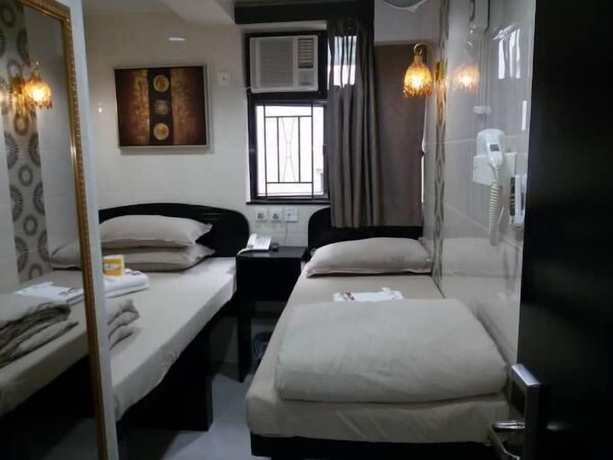 Imagen de la habitación del Hotel Asia Inn. Foto 8