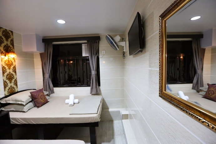 Imagen de la habitación del Hotel Asia Inn. Foto 12