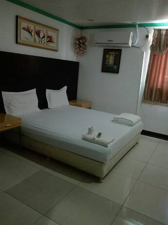 Imagen de la habitación del Hotel Asia Novo Boutique Hotel - Kalibo. Foto 16