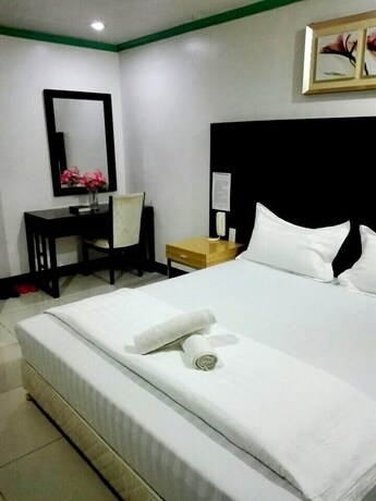 Imagen de la habitación del Hotel Asia Novo Boutique Hotel - Kalibo. Foto 18