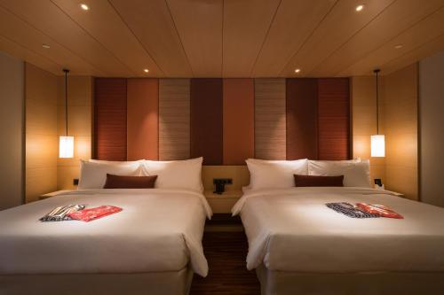 Imagen de la habitación del Hotel Asia Pacific Beitou. Foto 4