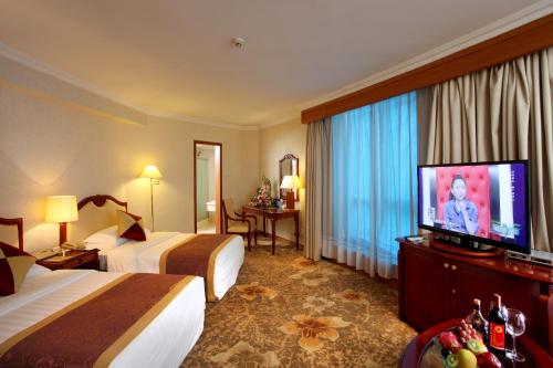Imagen de la habitación del Hotel Asia Pacific Garden - Beijing. Foto 11