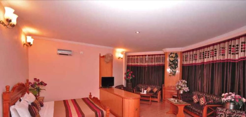 Imagen de la habitación del Hotel Asian Plaza Mcleodganj. Foto 2