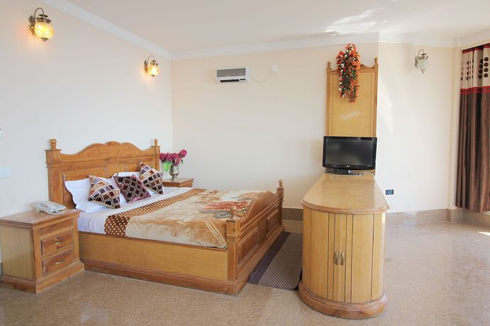 Imagen de la habitación del Hotel Asian Plaza Mcleodganj. Foto 4