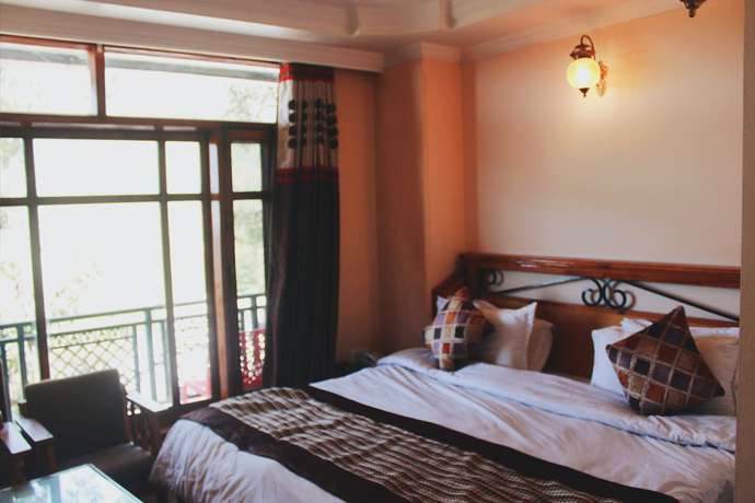 Imagen de la habitación del Hotel Asian Plaza Mcleodganj. Foto 5