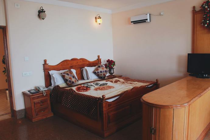 Imagen de la habitación del Hotel Asian Plaza Mcleodganj. Foto 8
