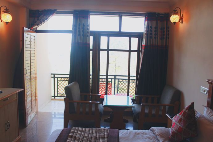 Imagen de la habitación del Hotel Asian Plaza Mcleodganj. Foto 9