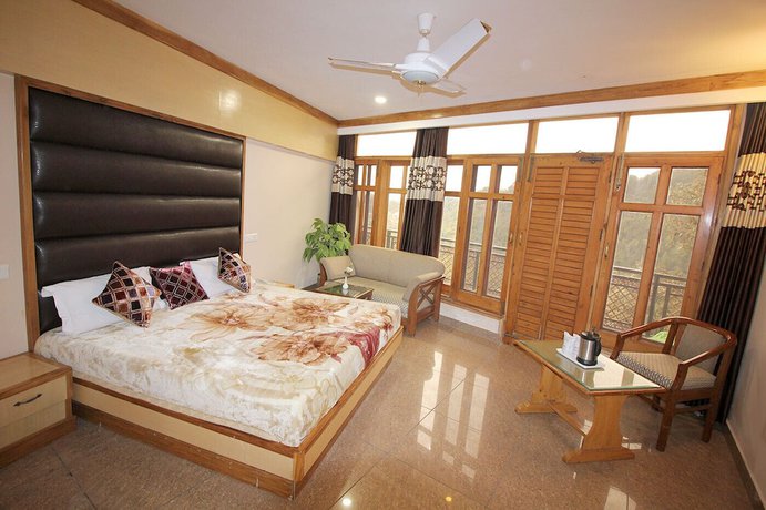Imagen de la habitación del Hotel Asian Plaza Mcleodganj. Foto 12
