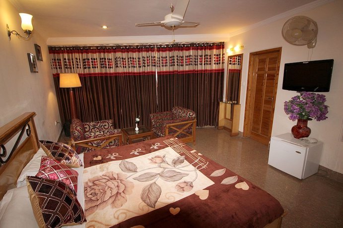 Imagen de la habitación del Hotel Asian Plaza Mcleodganj. Foto 16