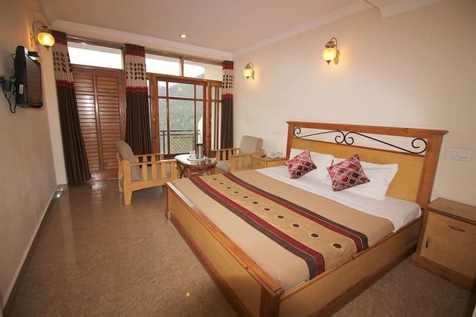 Imagen de la habitación del Hotel Asian Plaza Mcleodganj. Foto 17