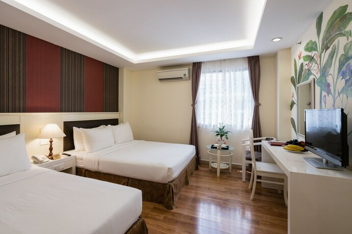 Imagen de la habitación del Hotel Asian Ruby Center Point. Foto 6